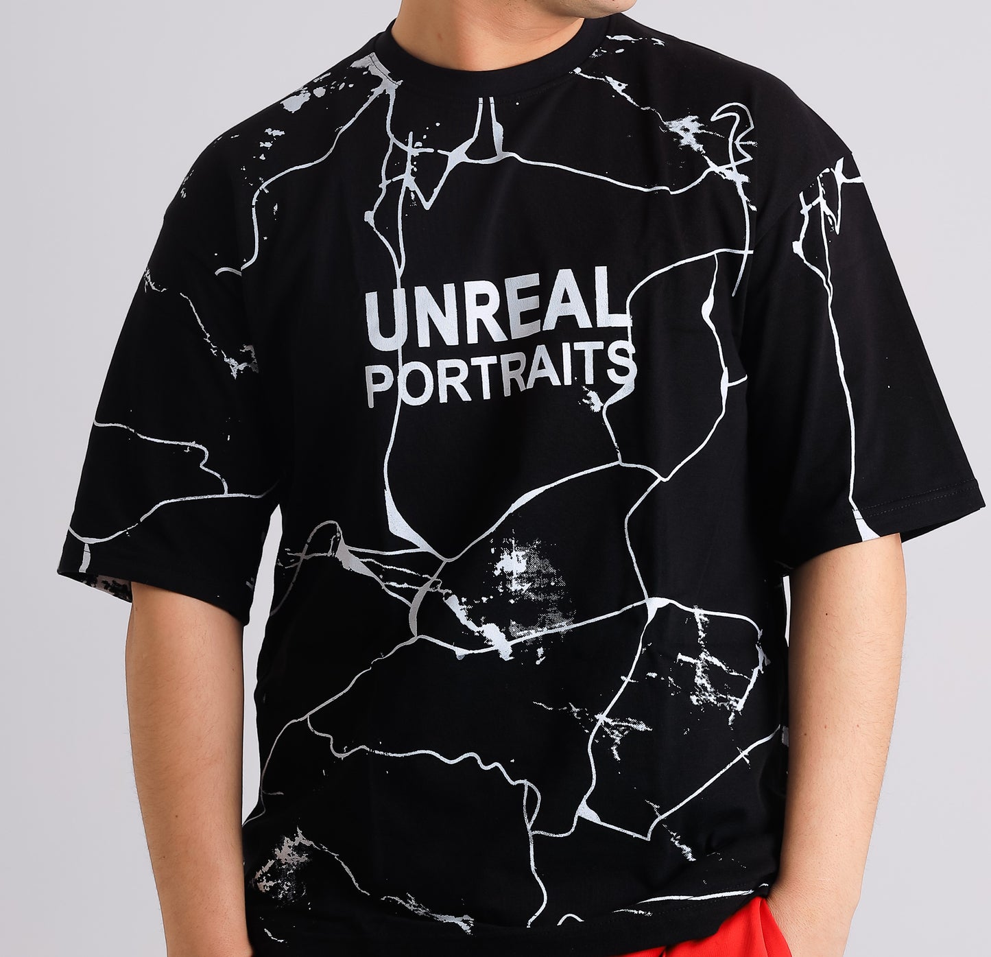 UNREAL PORTRAITS Cracked Pattern Tee – Monochrome Edition