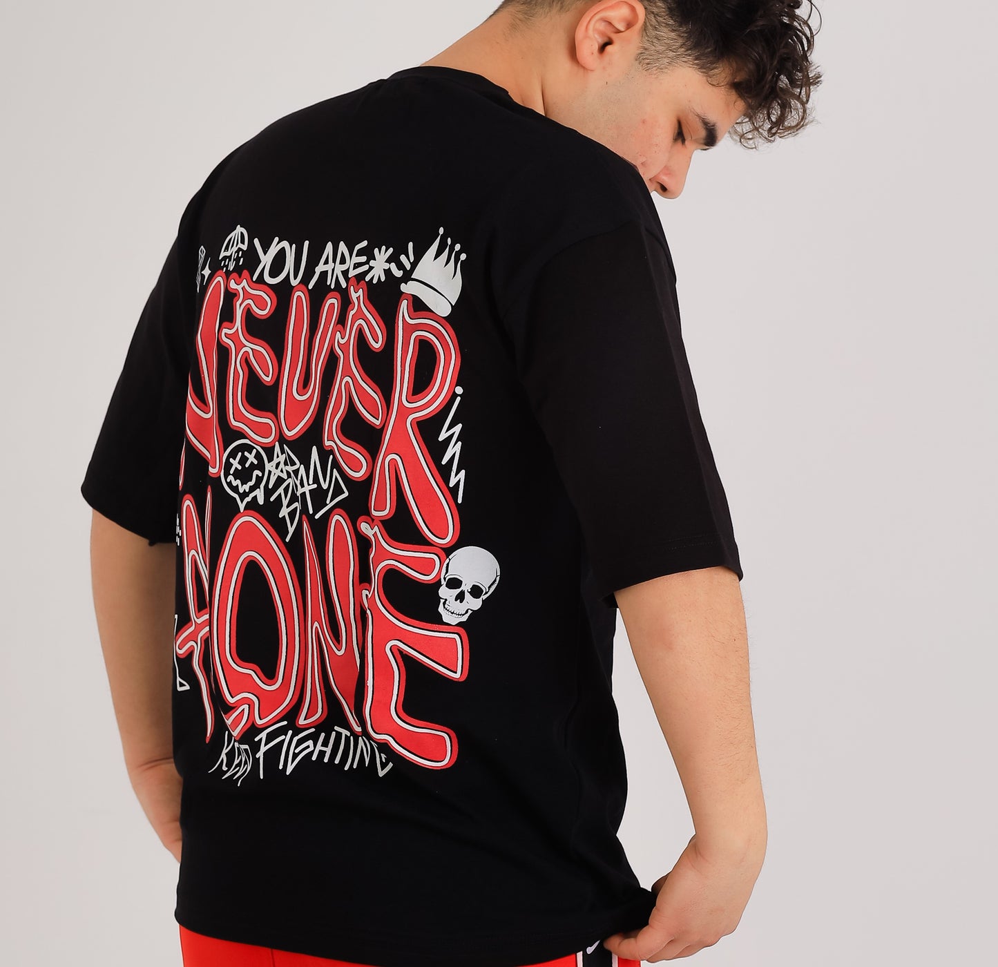 NEVER ALONE Statement Tee – Graffiti Edition