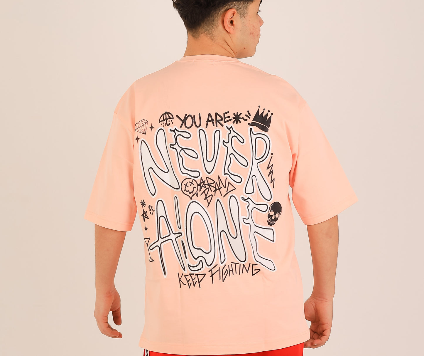 NEVER ALONE Statement Tee – Graffiti Edition