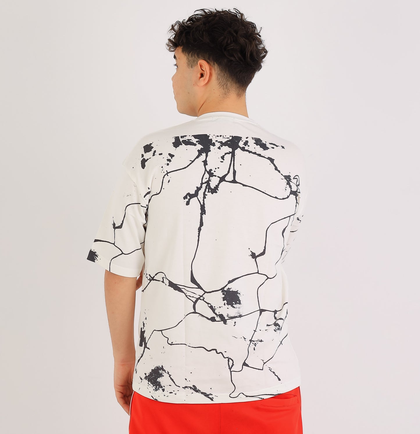 UNREAL PORTRAITS Cracked Pattern Tee – Monochrome Edition