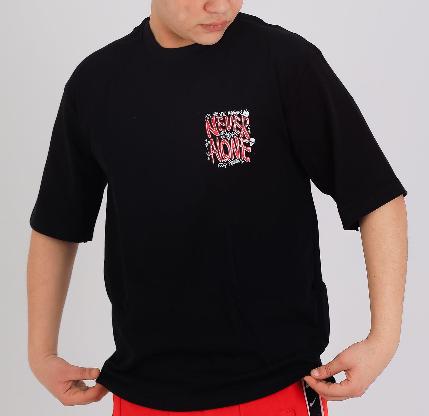 NEVER ALONE Statement Tee – Graffiti Edition