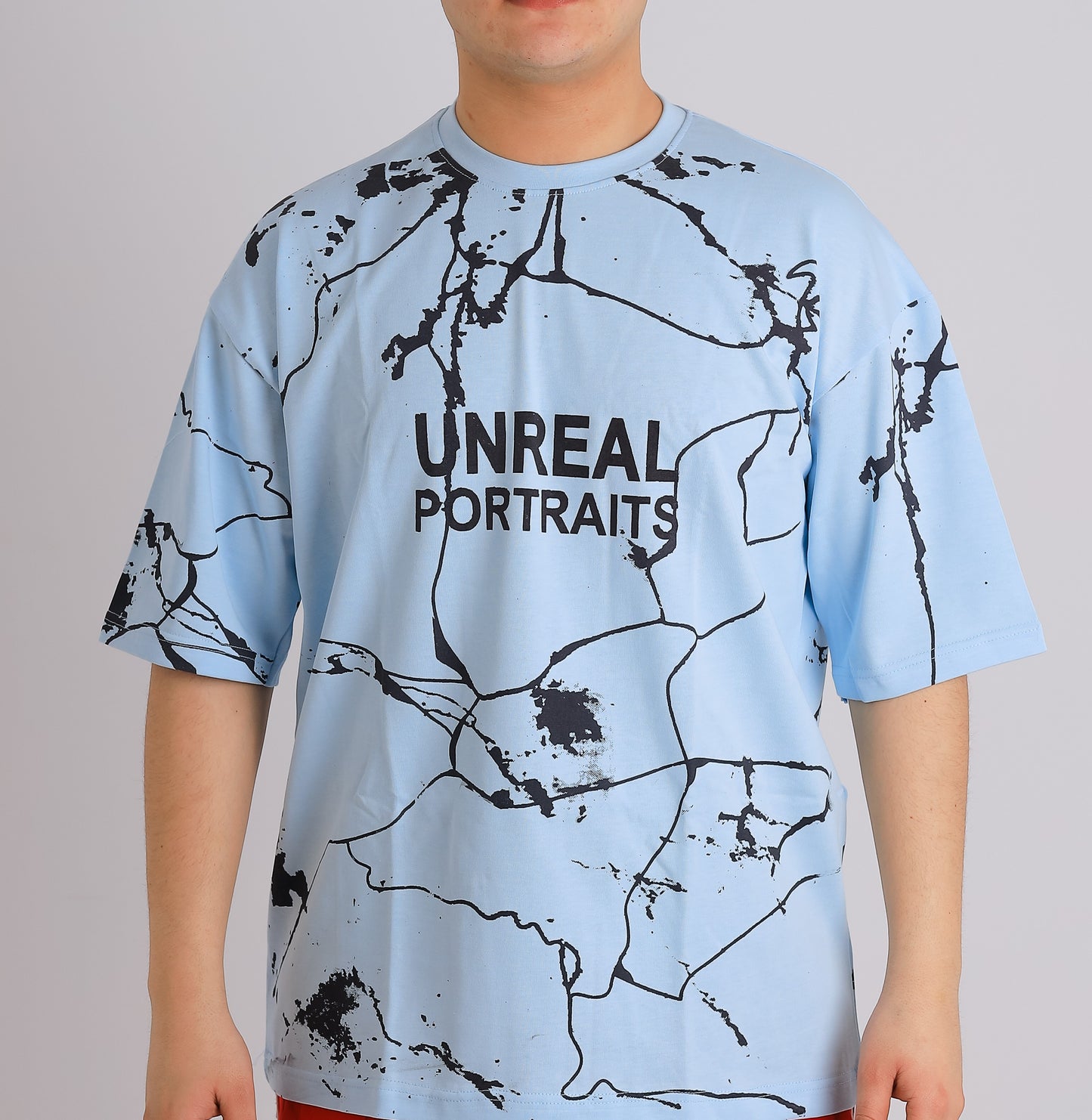 UNREAL PORTRAITS Cracked Pattern Tee – Monochrome Edition